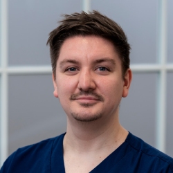 A headshot of Lee Wakefield, Lead Dental Nurse at Total Orthodontics Harrogate