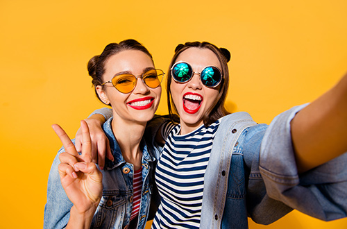 two friends taking selfie