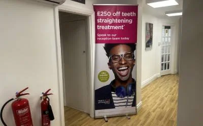 Poster on display in the corridor of Total Orthodontics Brighton