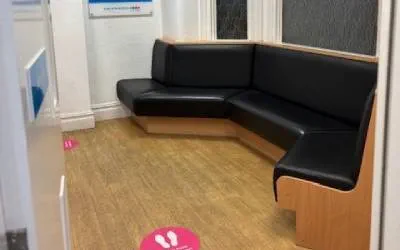 Bench seating in downstairs waiting room